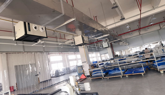 制衣廠制冷降溫，安裝星科蒸發冷省電空調-臥式射流款